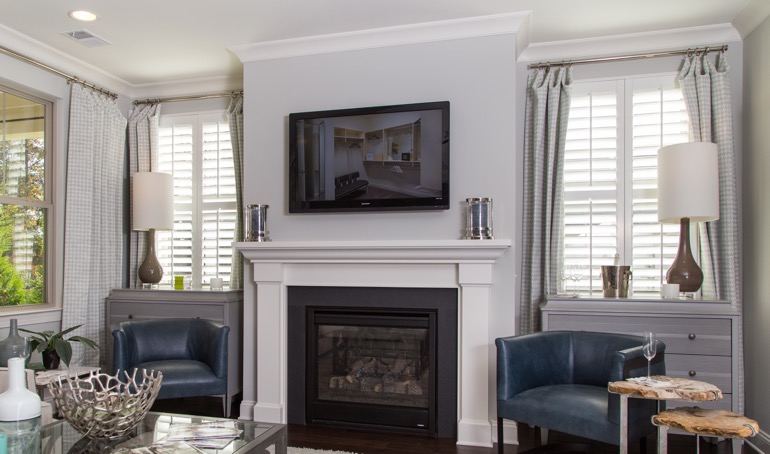 Tampa fireplace with white shutters.